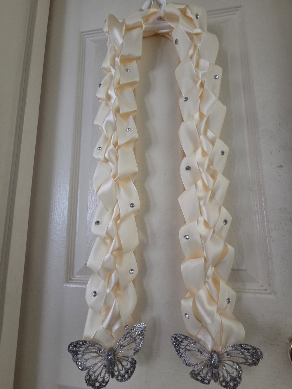 Ivory Ribbon Lei with Rhinestones and Silver Butterfly Accents